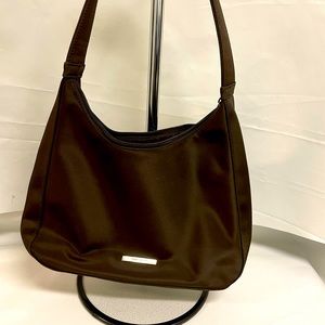 All black Nine West purse.